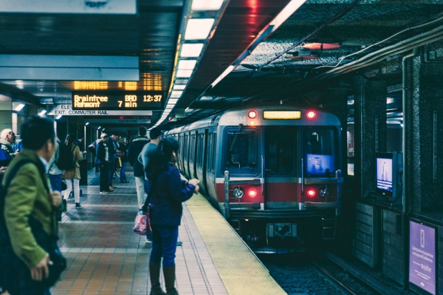 Commuters wait for a Red Line subway train, part of Boston’s public transit system. A new study by MIT researchers shows that low-income people use mass transit significantly more often when they have access to fare reductions.