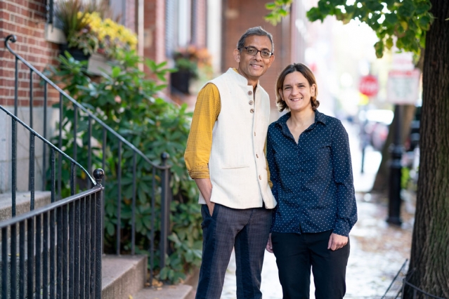 MIT economists Abhijit Banerjee and Esther Duflo stand outside their home after learning that they have been named co-winners of the 2019 Nobel Prize in economic sciences. They will share the prize with Michael Kremer of Harvard University. Photo: Bryce Vickmark